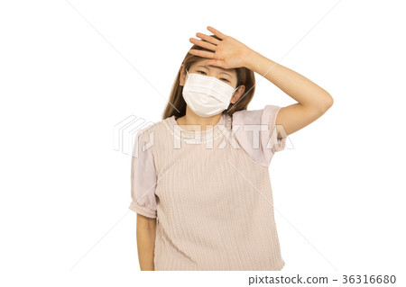Young Japanese woman suffering from hay fever Young Japanese woman suffering from hay fever 36316680