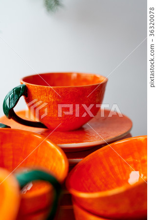 The color of the sun. Warmth. Bright orange dishes The color of the sun. Warmth. Bright orange dishes 36320078