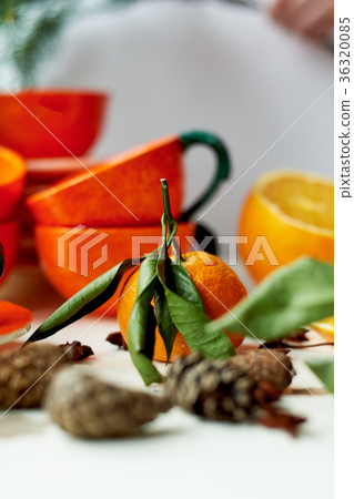 The color of the sun. Warmth. Bright orange dishes 36320085