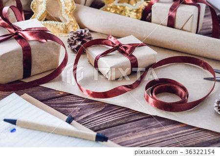 Holiday decorations and notebook with gift list 36322154