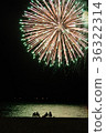People watching a skyrocket 36322314