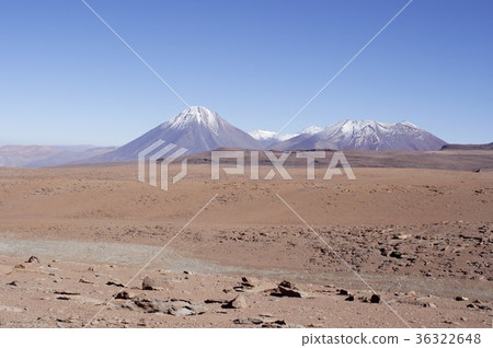 Mountains around Rikankabul volcano in the Andes Mountains seen from the Atacama Highlands, north of South American Chile in sunny summer 36322648