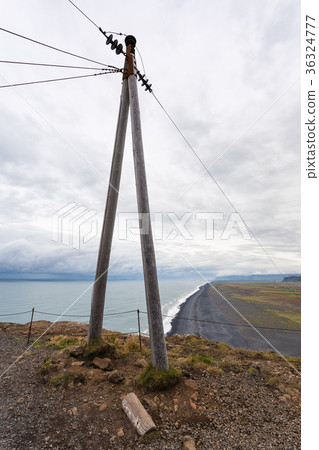 electric wire post on Dyrholaey cape in Iceland 36324777