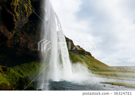 cave and Seljalandsfoss waterfall in Iceland 36324781