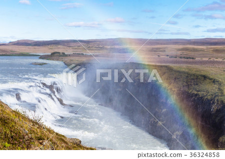 rainbow over Gullfoss waterfall in canyon 36324858