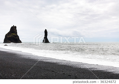 Reynisdrangar basalt columns on Reynisfjara beach Reynisdrangar basalt columns on Reynisfjara beach 36324872