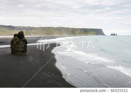 above view of rock on Kirkjufjara beach in Iceland 36325531