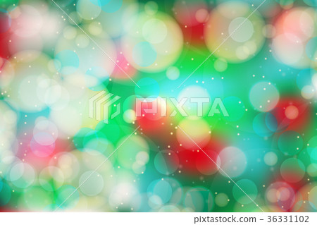 Festive colorful bokeh glitter light blur on green Festive colorful bokeh glitter light blur on green 36331102