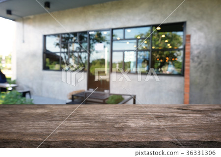 Image of dark wooden table in front of abstract Image of dark wooden table in front of abstract 36331306