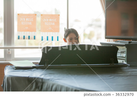 High school student piano playing High school student piano playing 36332970