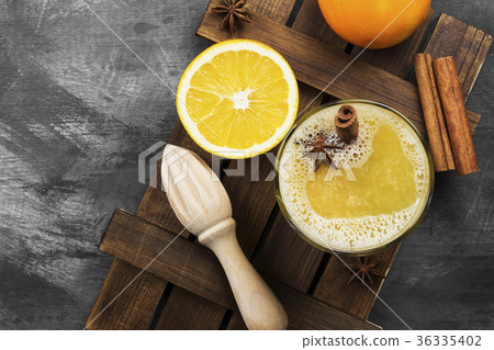 Winter hot drink from oranges and spices Winter hot drink from oranges and spices 36335402