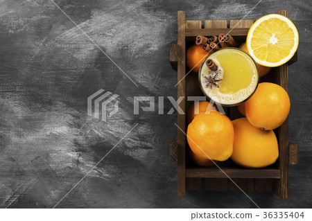 Winter hot drink from oranges and spices Winter hot drink from oranges and spices 36335404