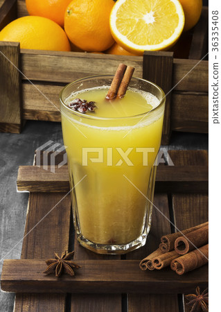 Winter hot drink from oranges and spices Winter hot drink from oranges and spices 36335408