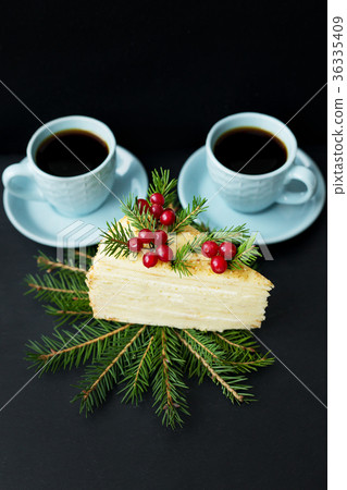 piece of cake decorated tree and berries on a piece of cake decorated tree and berries on a 36335409