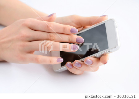 Women's hands holding mobile phone Women's hands holding mobile phone 36336151
