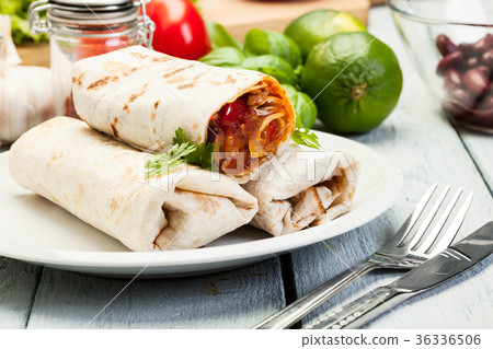 Mexican burritos on a plate 36336506