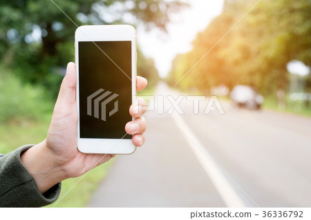 mobile phone with blank screen on console car mobile phone with blank screen on console car 36336792