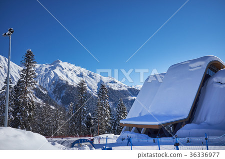 Skiers on the chairlift 36336977