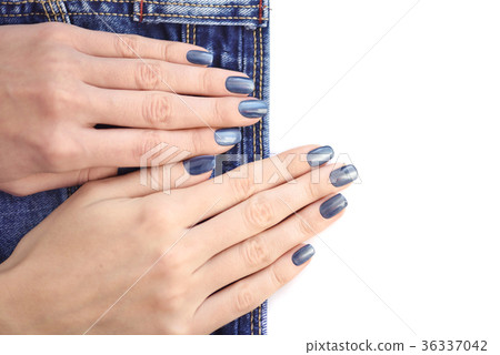 Female hands with dark blue manicured nails Female hands with dark blue manicured nails 36337042