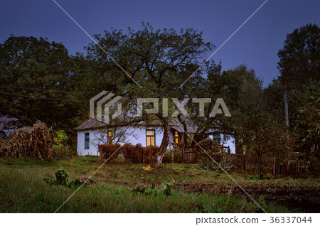 Old hut in village autumn evening scene Old hut in village autumn evening scene 36337044