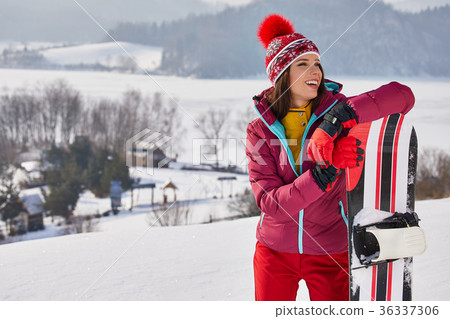 winter, leisure, sport and people concept - happy young woman in winter, leisure, sport and people concept - happy young woman in 36337306