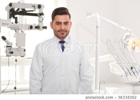 Professional dentist at his clinic Professional dentist at his clinic 36338302