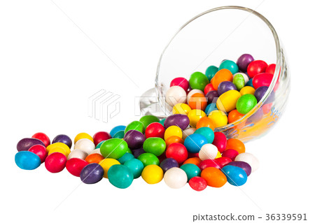 colorful sprinkle candies in a glass isolated colorful sprinkle candies in a glass isolated 36339591