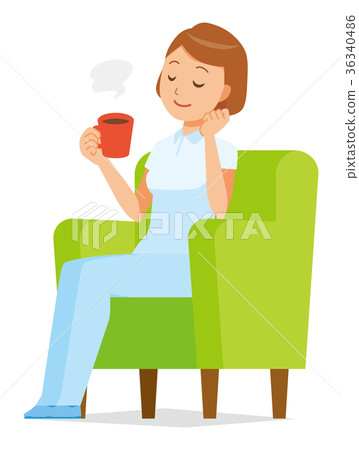 A female nurse in white uniform is sitting on the sofa and drinking coffee 36340486