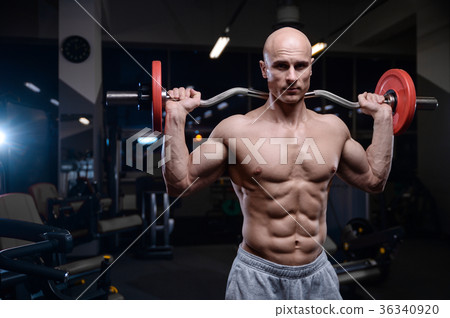 Brutal strong bodybuilder athletic men muscles 36340920