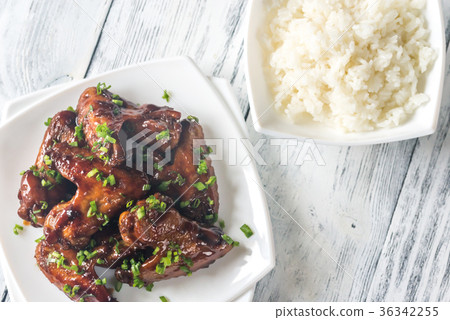 Bowl of teriyaki chicken wings with rice Bowl of teriyaki chicken wings with rice 36342255