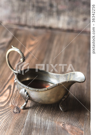 Maple syrup in vintage sauce boat 36342256