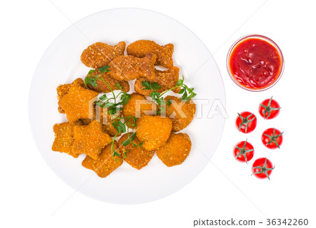 Nuggets of different shapes with ketchup on white Nuggets of different shapes with ketchup on white 36342260