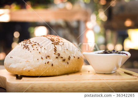 Fresh bread with Fruit jam on wooden background Fresh bread with Fruit jam on wooden background 36342265