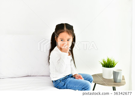 Little girl is being annoyed by an adult. Little girl is being annoyed by an adult. 36342677