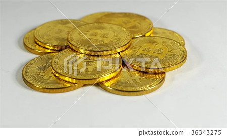 Rotating Stack Of Gold Bitcoins On Turntable 36343275