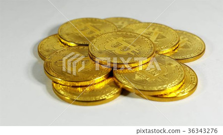 Rotating Stack Of Gold Bitcoins On Turntable 36343276