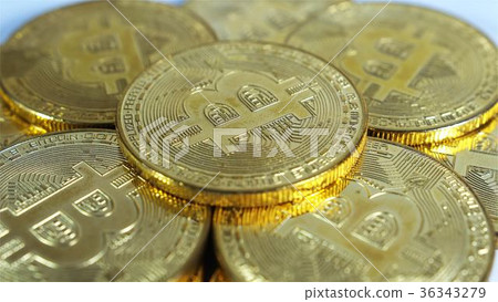 Rotating Stack Of Gold Bitcoins On Turntable 36343279