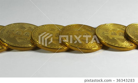 Rotating Stack Of Gold Bitcoins On Turntable Rotating Stack Of Gold Bitcoins On Turntable 36343283