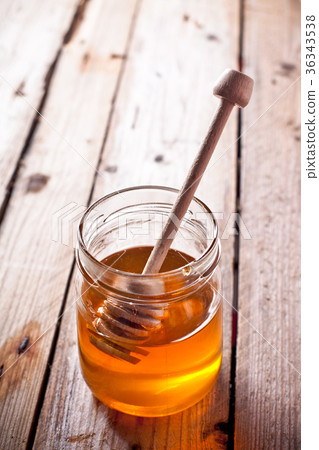 full honey pot and honey stick full honey pot and honey stick 36343538