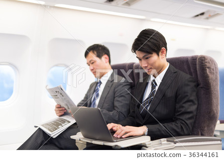 Airplane business trip business man 36344161