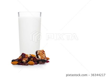 Cereal bar bits almond chocolate and glass of milk Cereal bar bits almond chocolate and glass of milk 36344217