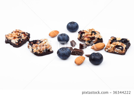 Healthy cereal bar with almond and blueberries Healthy cereal bar with almond and blueberries 36344222