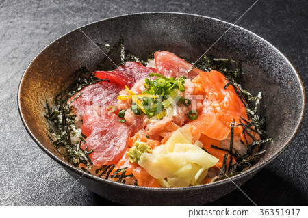 Seafood bowl Bowl of rice topped with sashimi japanese food Seafood bowl Bowl of rice topped with sashimi japanese food 36351917