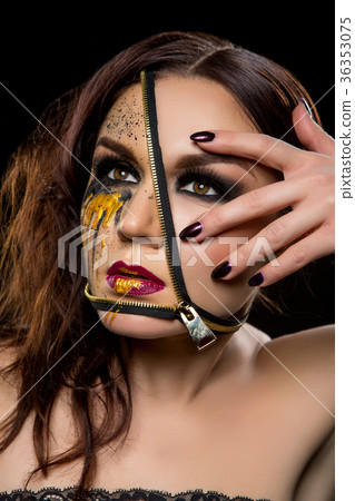 beautiful young woman with zipper on face 36353075