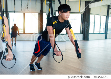 side view of strong Asian male coach 36356630