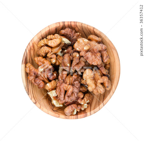 Shelled walnut in a wooden bowl 36357412