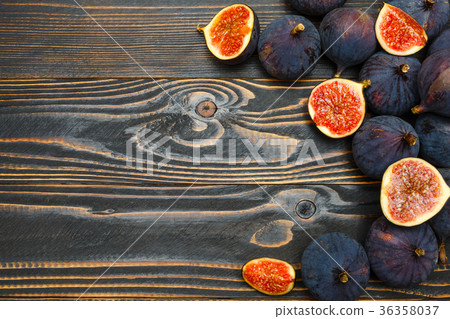 Figs on wooden background 36358037