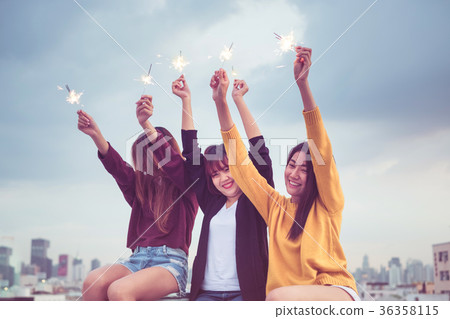 Happy of asia girl friends enjoy and play sparkler Happy of asia girl friends enjoy and play sparkler 36358115