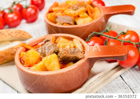Stewed potatoes in ceramic bowl 36358372