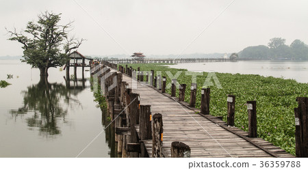 U Bein Bridge at rainy day in Mandalay, Myanmar U Bein Bridge at rainy day in Mandalay, Myanmar 36359788